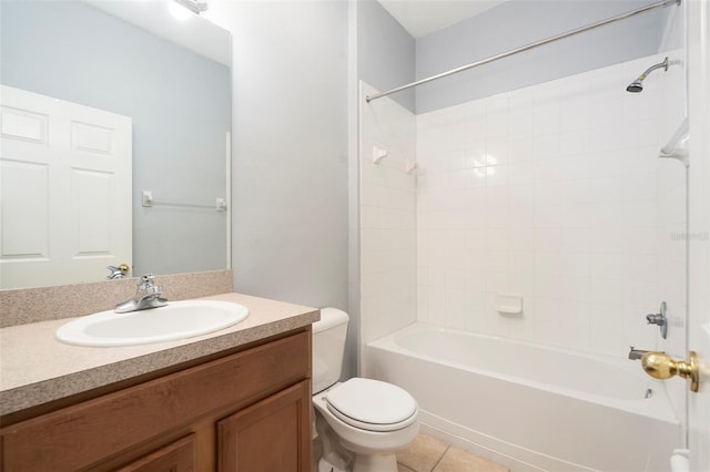 full bathroom with tile patterned flooring, vanity, toilet, and tiled shower / bath combo