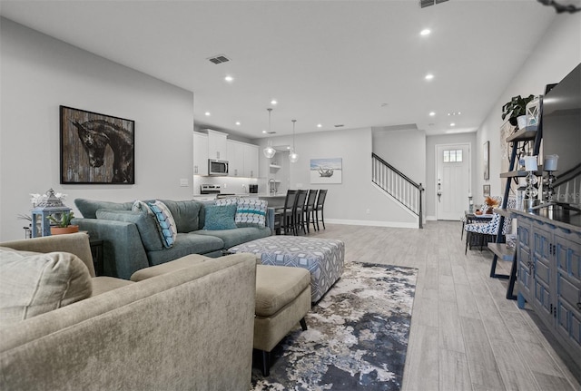 living room featuring light hardwood / wood-style flooring