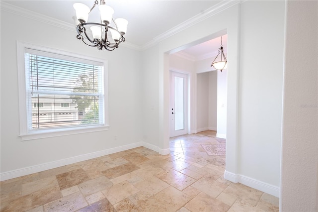 empty room with crown molding and a notable chandelier