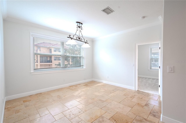 unfurnished dining area featuring plenty of natural light and ornamental molding