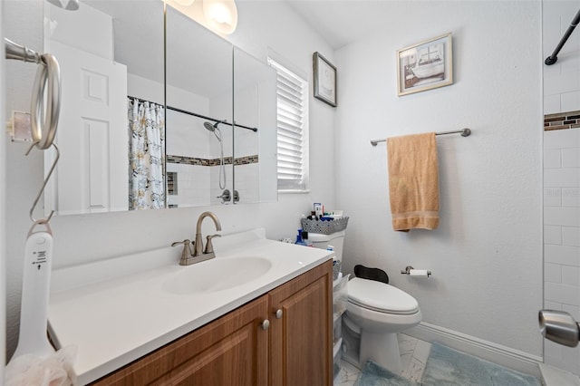 bathroom with a shower with curtain, vanity, and toilet