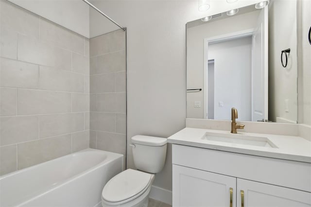 full bathroom featuring vanity, toilet, and tiled shower / bath combo