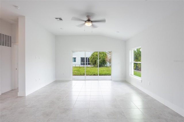 475 Winwood Ct, Port Charlotte, FL 33954 - empty room with a ceiling fan, vaulted ceiling, light tile patterned floors, a smoke detector, and baseboards