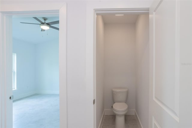 475 Winwood Ct, Port Charlotte, FL 33954 - bathroom featuring ceiling fan, toilet, and baseboards
