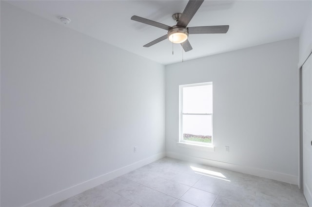 475 Winwood Ct, Port Charlotte, FL 33954 - spare room featuring baseboards, light tile patterned flooring, and a smoke detector