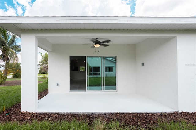 view of patio with ceiling fan