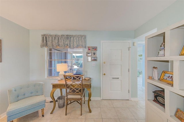 living area with light tile patterned floors