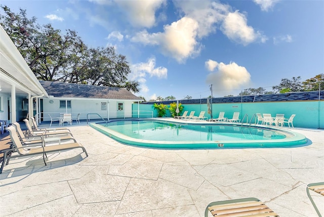 view of pool featuring a patio area