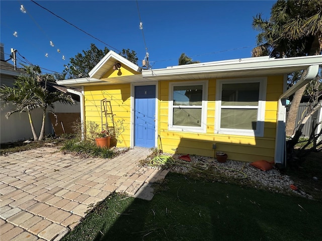 view of front of home featuring a patio