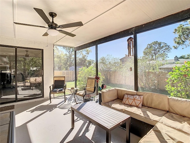 sunroom / solarium with ceiling fan