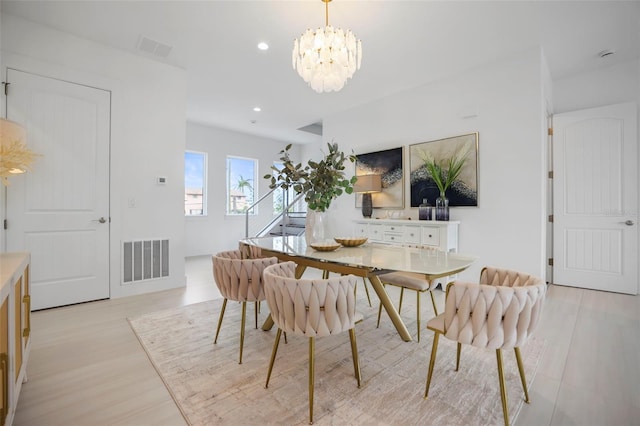 dining room with a notable chandelier