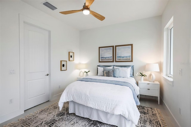 bedroom featuring hardwood / wood-style floors and ceiling fan