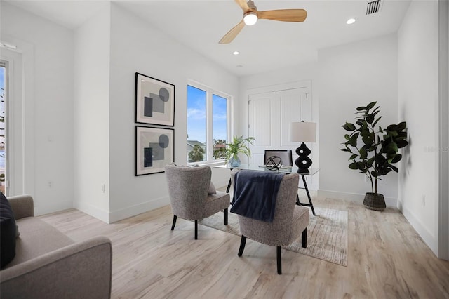 dining room featuring ceiling fan and light hardwood / wood-style floors