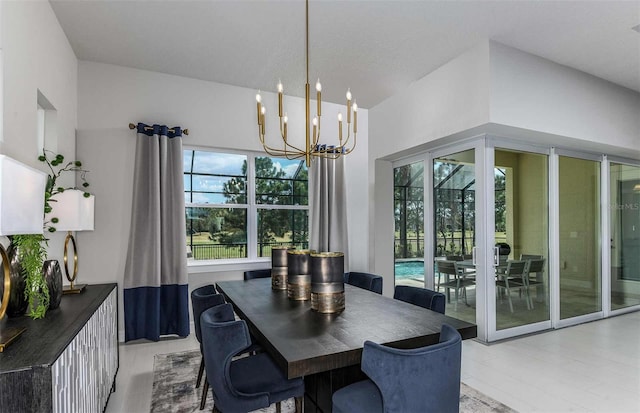 dining area featuring a notable chandelier