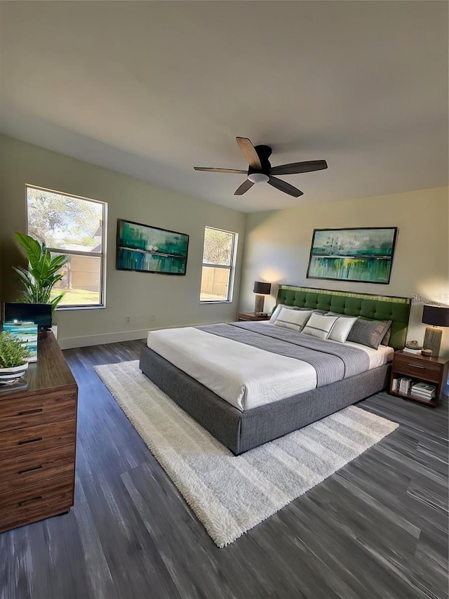 1302 E Annie St, Tampa, FL 33612 - bedroom with wood finished floors and a ceiling fan