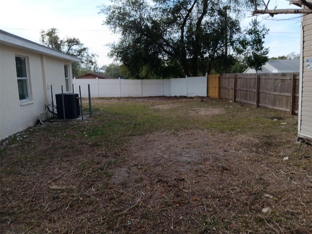 view of yard featuring central AC