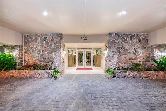 doorway to property featuring french doors