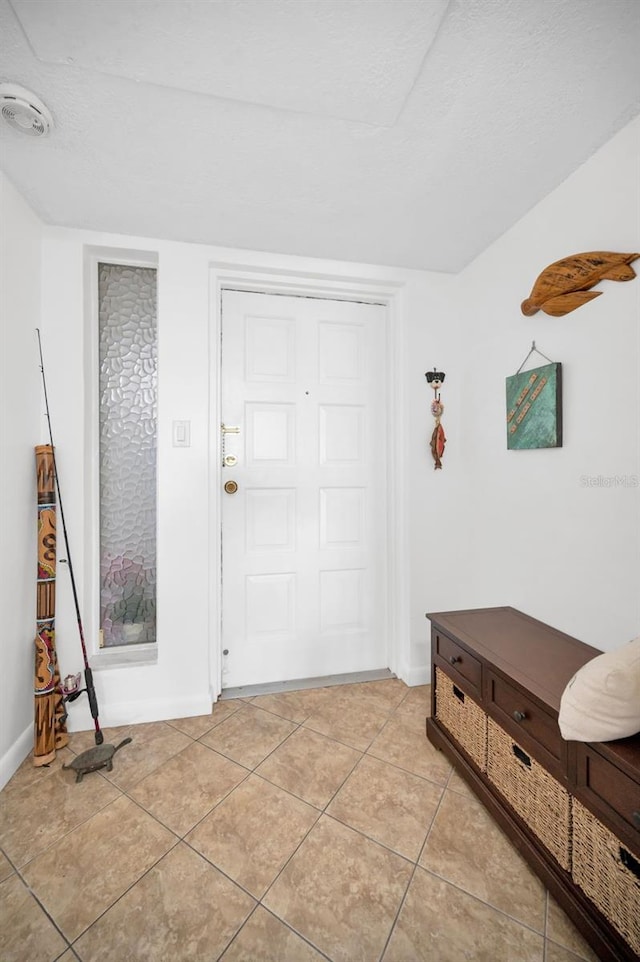 view of tiled entrance foyer