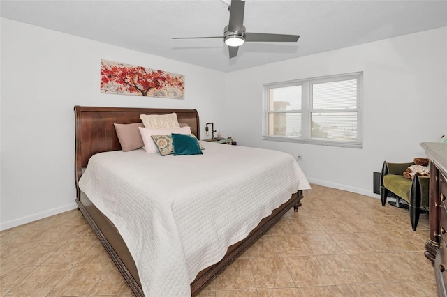 bedroom featuring ceiling fan and light tile patterned flooring