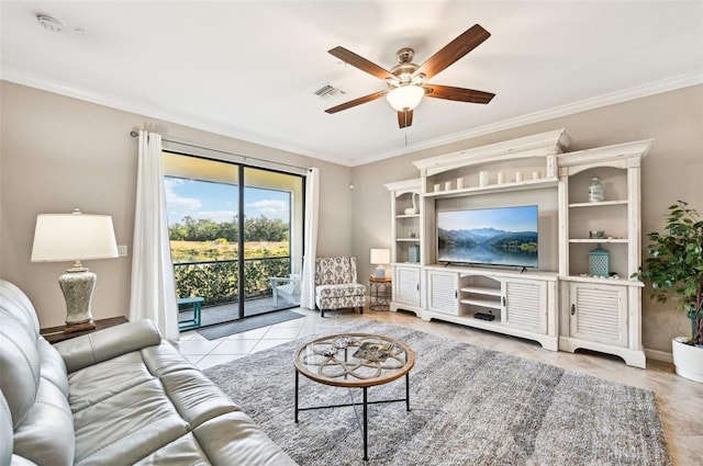 tiled living room with ceiling fan and ornamental molding