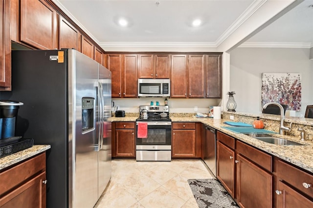 kitchen with light stone countertops, kitchen peninsula, ornamental molding, stainless steel appliances, and sink