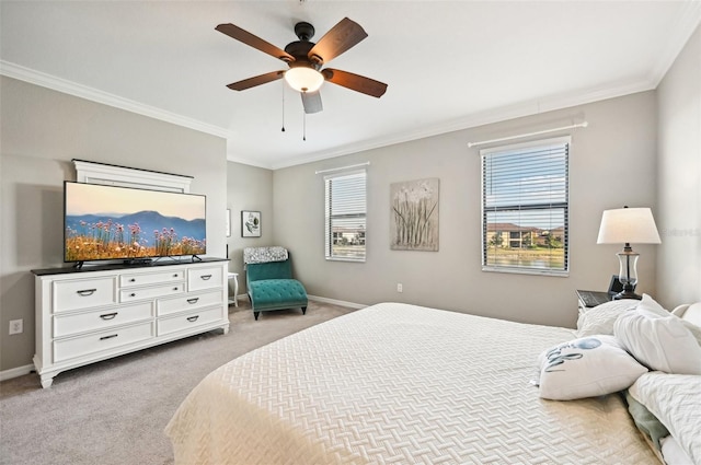 carpeted bedroom featuring multiple windows, ceiling fan, and ornamental molding