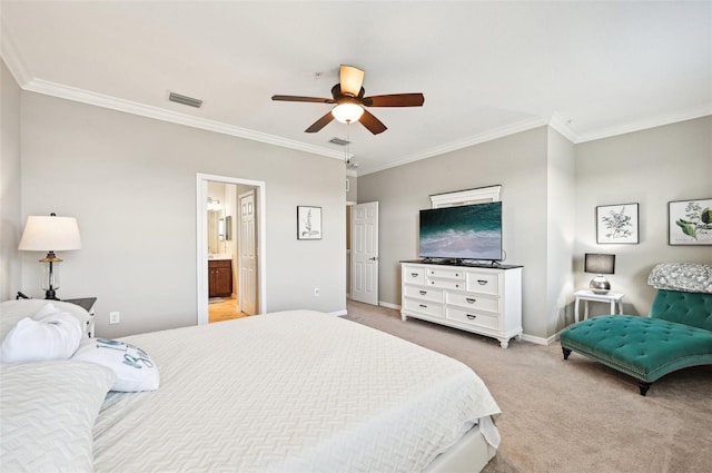 carpeted bedroom with ceiling fan, ensuite bathroom, and ornamental molding