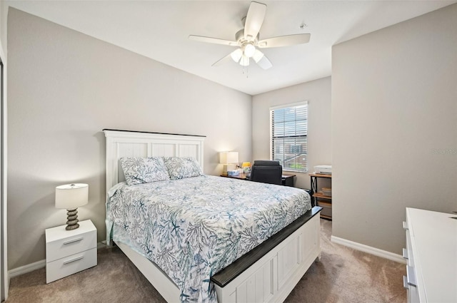 bedroom with ceiling fan and carpet