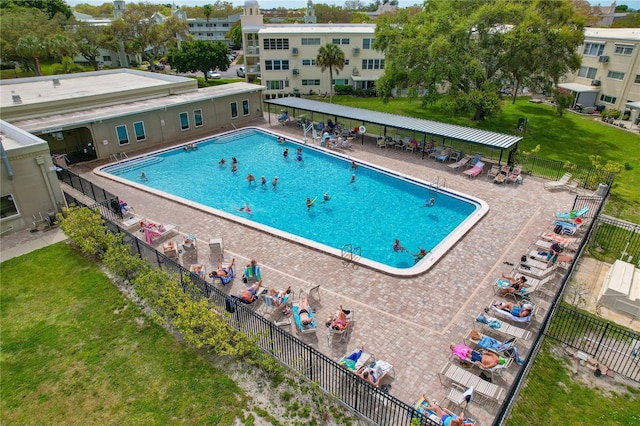 view of swimming pool with a patio area