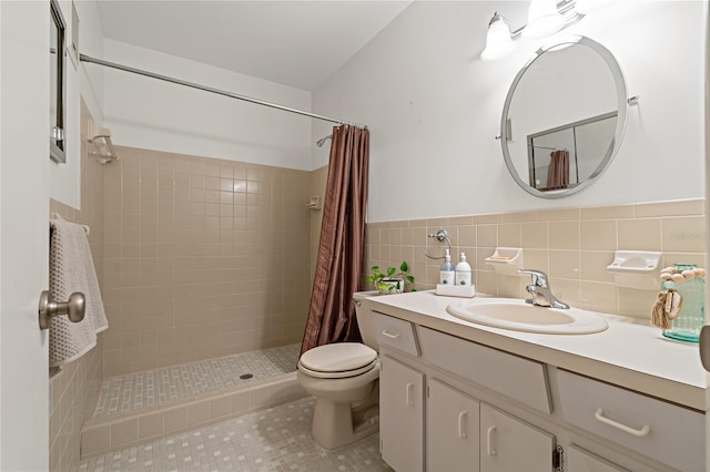 bathroom with tile patterned flooring, toilet, tile walls, and walk in shower