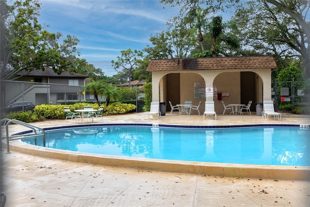 view of swimming pool featuring a patio