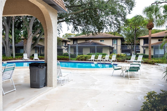 view of pool featuring a patio area