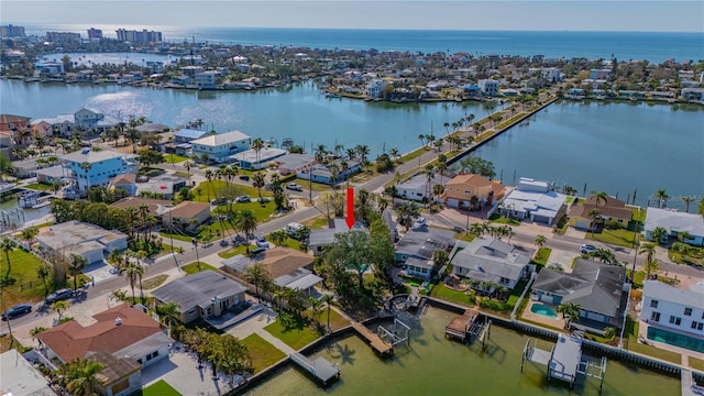 birds eye view of property featuring a water view