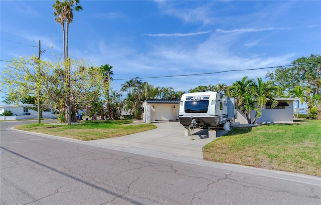 view of front of property with a front lawn