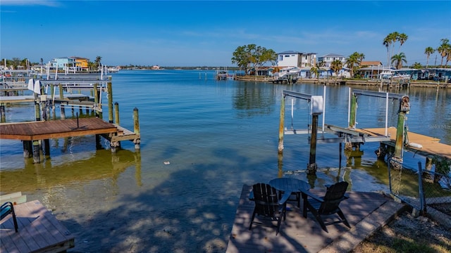 view of dock with a water view