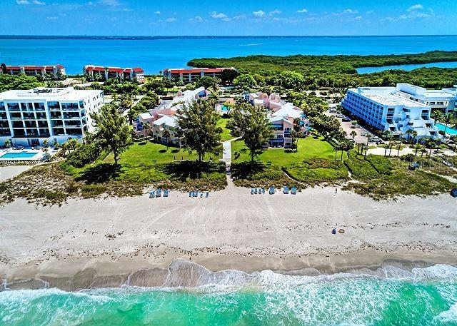 aerial view featuring a view of the beach and a water view