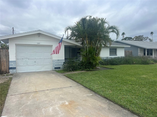 single story home with a front lawn and a garage