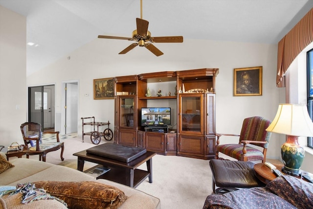 carpeted living room featuring french doors, high vaulted ceiling, and ceiling fan