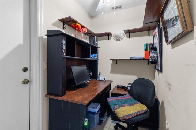 tiled office with ceiling fan