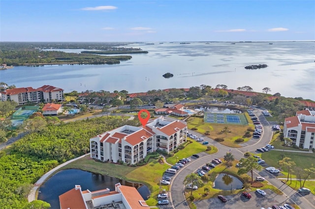 bird's eye view with a water view