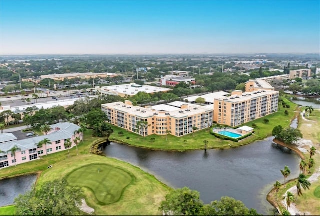 bird's eye view with a water view