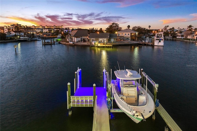 view of dock with a water view