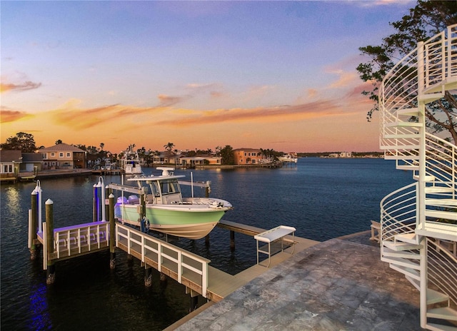 dock area with a water view