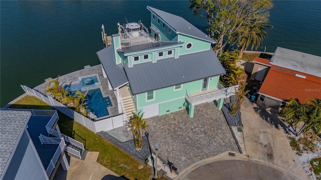 drone / aerial view featuring a water view