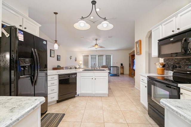 kitchen with ceiling fan, white cabinets, decorative light fixtures, light tile patterned flooring, and black appliances