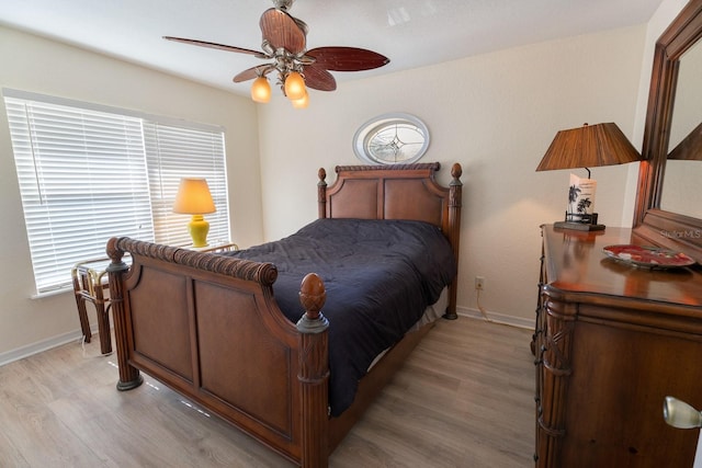 bedroom featuring ceiling fan and light hardwood / wood-style floors