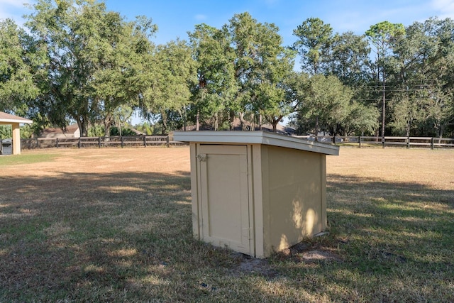 view of outdoor structure with a yard