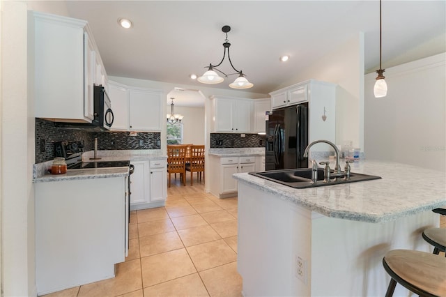 kitchen with black fridge with ice dispenser, light tile patterned floors, a sink, electric range oven, and a peninsula