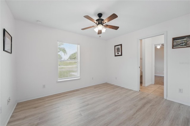 4995 County Road 121d, Wildwood, FL 34785 - spare room featuring ceiling fan, light wood finished floors, and baseboards