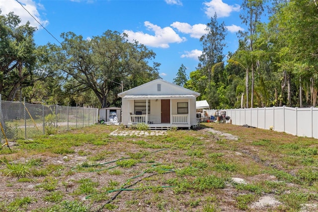 view of yard featuring covered porch